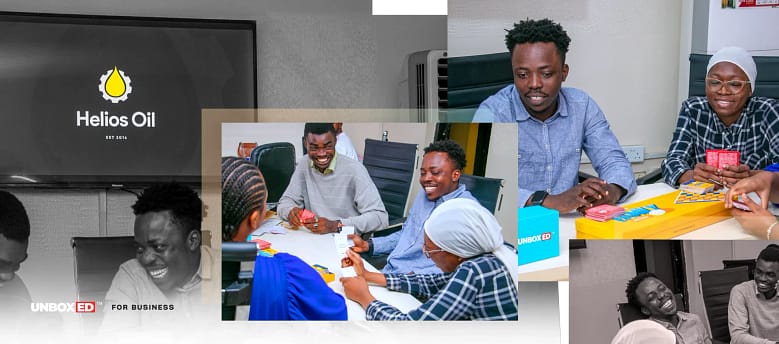 UnboxED for Business 3 People in an office playing Unboxed card games in Nigeria